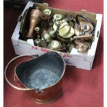 A collection of miscellaneous metalware, to include early 20th century copper helmet shaped coal