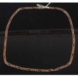 A 9ct yellow gold fetter and three link chain, with lobster clasp, length 515mm, width 4.35mm, gross