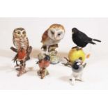A Beswick figure of a chaffinch, model No.991; together with Goebel figures of a robin and a