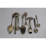 A small collection of silver and white metal loose flatware, to include Victorian silver sifting