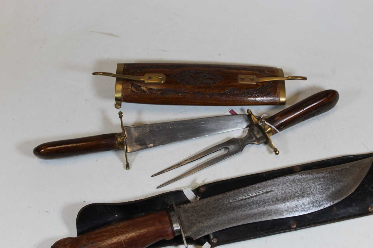 A 20th century wooden handled bowie knife, with leather sheath; together with a carved hardwood - Image 2 of 2