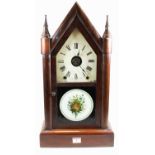 A late 19th century American mahogany cased steeple clock, having a painted dial with Roman numerals