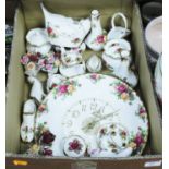 A collection of Royal Albert Old Country Roses chinaware, to include wall clock, clogs, stem vases