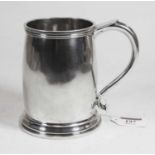 A mid-20th century silver tankard, of barrel shape with C-scroll handle, maker Atkin Brothers,