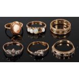 Four various 9ct rings (all missing stones, or with damage), 9.9g, together with an 18ct gold