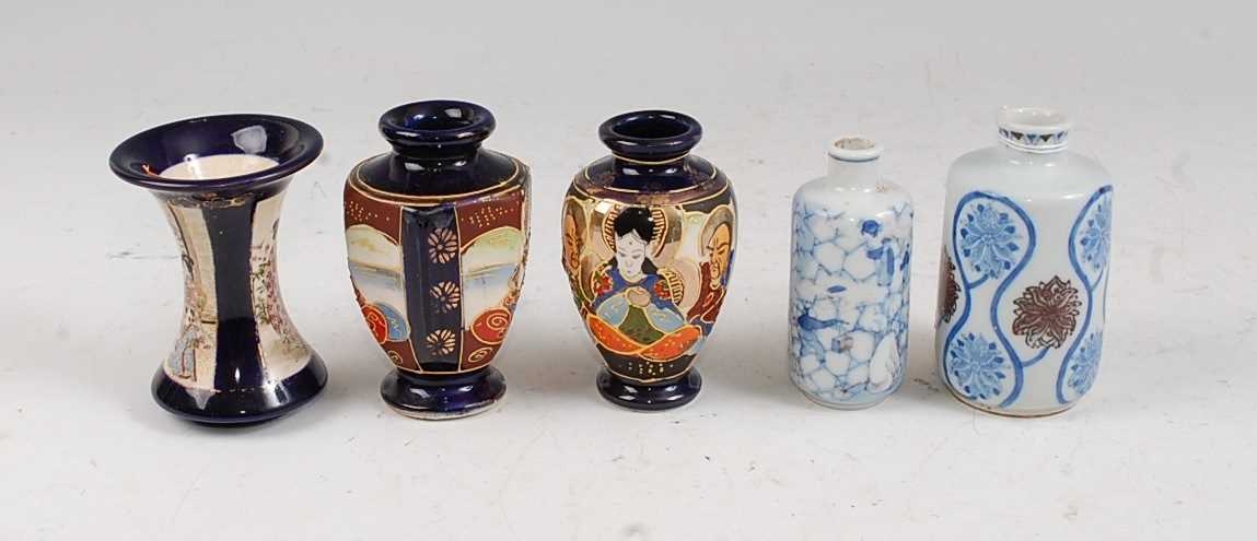 A Japanese Meiji period (1868-1912) Kinkozan style vase of waisted cylindrical form decorated with