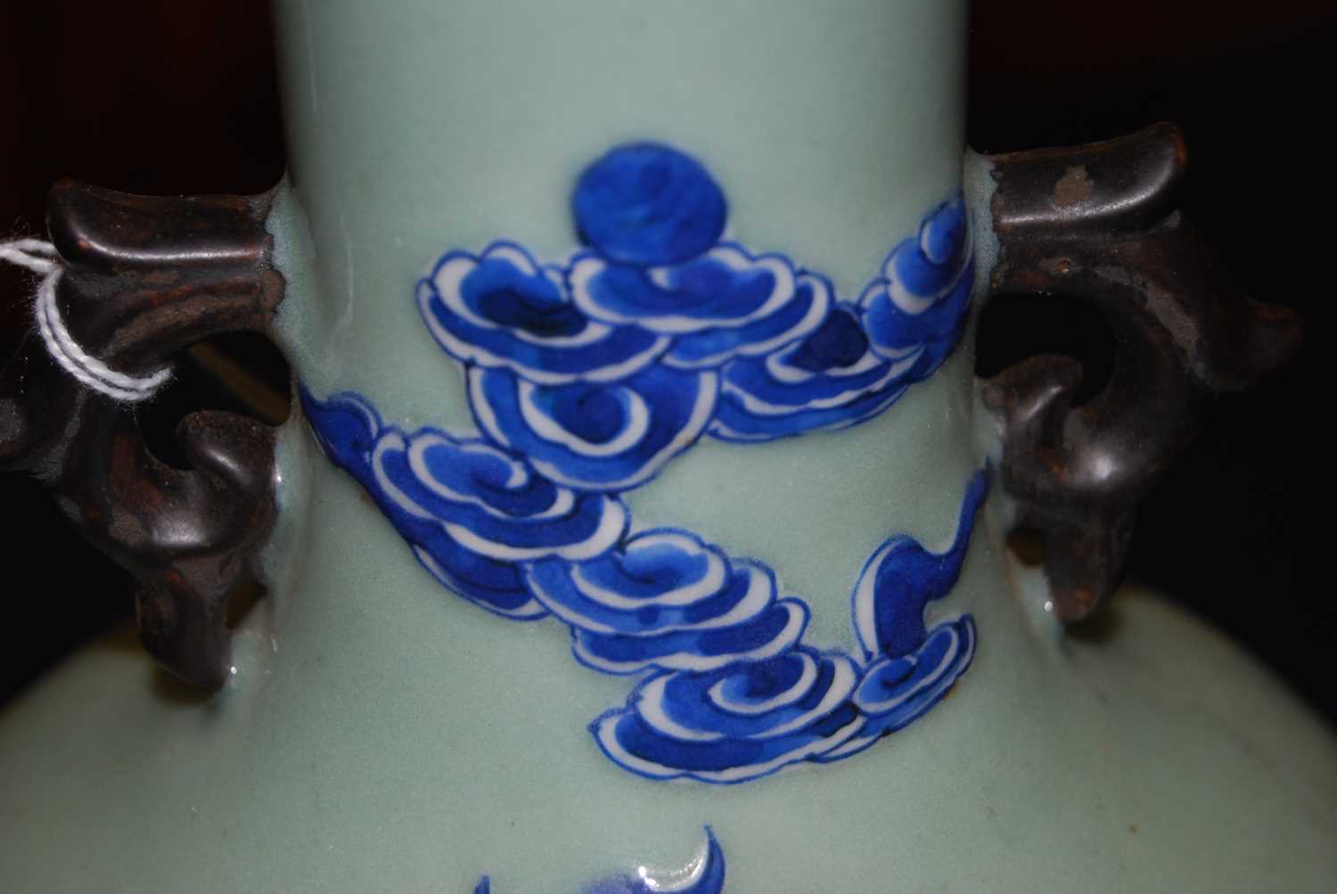 A Chinese export celadon ground baluster vase, having raised blue and white figure and cloud - Image 9 of 14