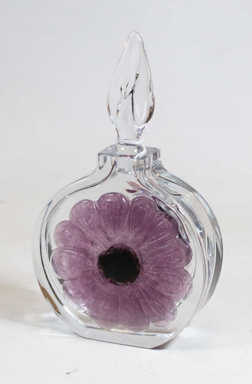 A Daum French glass decanter and stopper, of slab-sided circular form, decorated with a purple