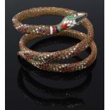 A base metal three-row snake bangle with cloisonné enamel decoration, length 490mm, gross weight