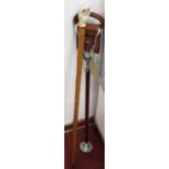 A shooting stick; together with a walking stick, the resin handle in the form of an owl (2)Condition