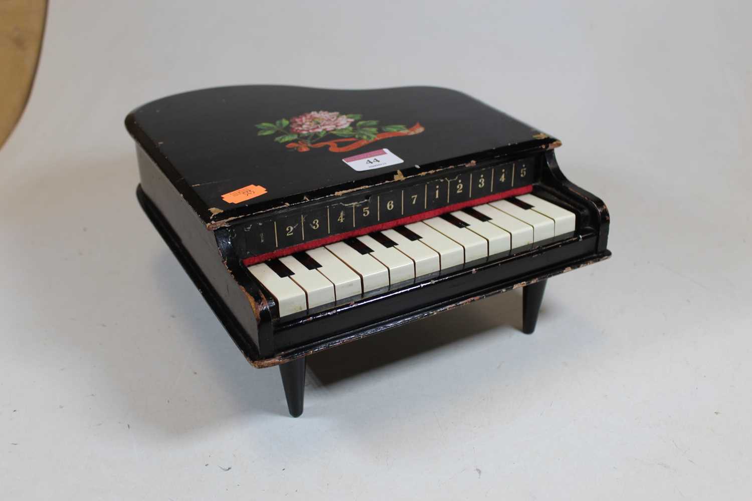 An early 20th century child's toy xylophone, in the form of a miniature grand piano, with floral and - Image 3 of 3