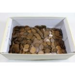 A box of English pre-decimal coinage, mainly being George V and later pennies and half-pennies etc