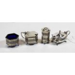 A George V silver three-piece cruet, of pierced hexagonal form, comprising open salt, mustard, and