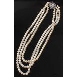 A three-row pearl necklet, comprising three rows of 69, 74 and 78 approx 5.5 to 5.8mm cultured
