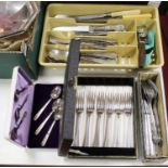 A collection of miscellaneous stainless steel and silver plated cutlery