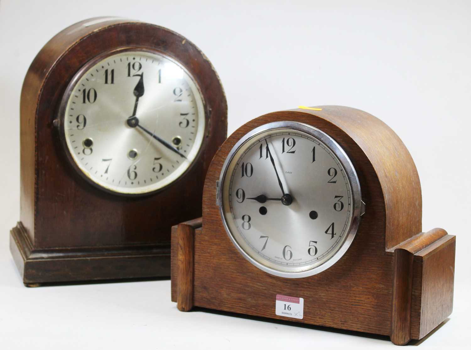 A 1930s oak cased eight day mantel clock, maker Enfield, the silvered dial showing Arabic