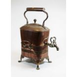 A 19th century copper kettle, with copper tap and on a pierced rectangular stand with spirit