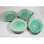 A collection of Spode Royal Jade plates and bowls, each on a green ground with faux basket-weave
