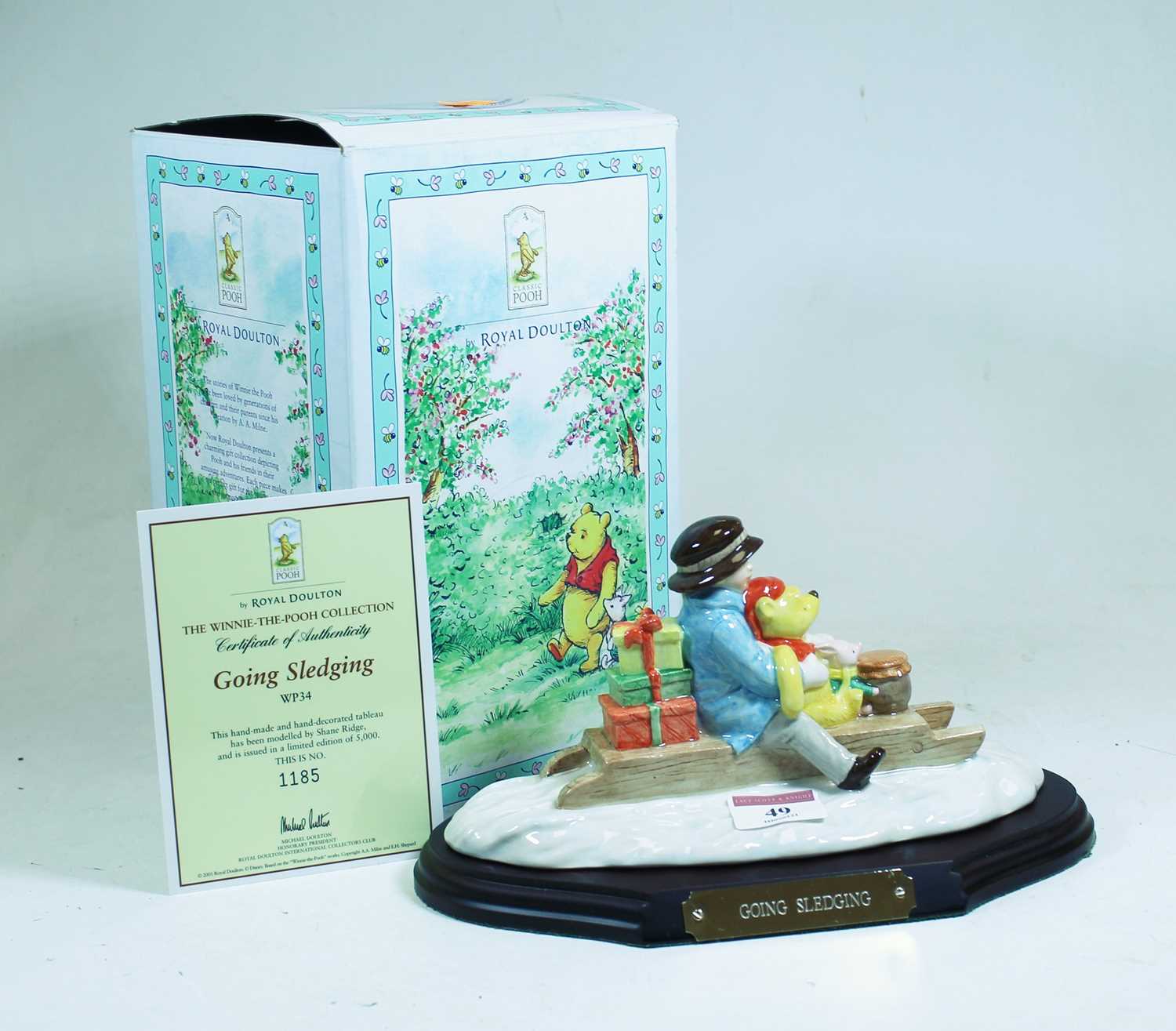 A Royal Doulton Winnie the Pooh collection figure group Going Sledging, No.1185, w.22cm, boxed