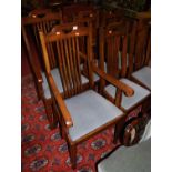 A set of six Edwardian walnut slatback dining chairs, each having blue upholstered drop-in pad seats