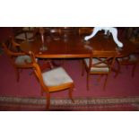 A reproduction yew wood dining suite, comprising; D-end pedestal dining table with single extra