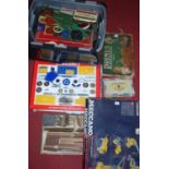 One box containing a quantity of Meccano and various accessories and three Meccano boxed kits