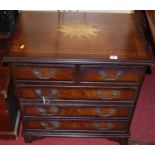 A reproduction mahogany small chest of two short over three long drawers, w.67.5cmCondition