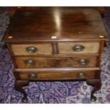 A 19th century mahogany dwarf chest of two short over two long drawers, the integral stand raised on