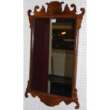 A contemporary mahogany Chippendale style fret carved rectangular wall mirror, 76.5 x 47cm