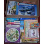 Two boxes containing a quantity of jigsaws including Airfix Battle of Britain Memorial Flight etc