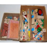 Two boxes containing a small quantity of building blocks etc