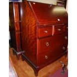 A contemporary Stag Minstrel slopefront writing bureau, w.79cm; together with a Stag Minstrel