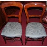 A set of four Victorian stained beech balloon back salon side chairs, with upholstered stuff over