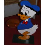 A painted hall stand in the form of Donald Duck, h.96cm