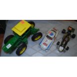 A Corgi John Player Special F1 car; a Burago Mercedes 300SL; and a modern John Deere tractor (3)