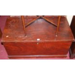 A 19th century scrumble-finish pine hinge-top tool chest, having iron end carry handles, w.94cm