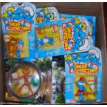 One box containing a quantity of Smurf figures, a boxed Ants figure, etc