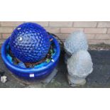 A contemporary blue glazed stoneware circular water feature; together with a pair of reproduction