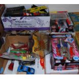 Three boxes containing various modern issue toys including Micro Scalextric, various plastic kits