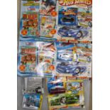 One box containing a quantity of HotWheels cars etc