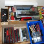 Three boxes containing various decorative trains, battery operated trains, etc