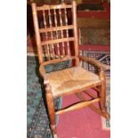 A 20th century stickback rocking chair in the Lancashire style