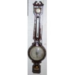 A mid-19th century rosewood and mother of pearl inlaid four-dial wheel barometer, the silvered scale
