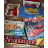 Two boxes of mixed toys, to include Triang Minic Nuffield tractor, Ponsiac Firebird radio controlled
