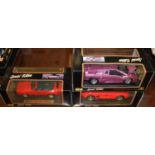 Three Maisto 1:18 scale boxed models, to include Porsche 911 Carrera, Mustang Mack III etc