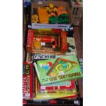 A quantity of modern toys including plastic construction vehicles, battery operated machine gun,