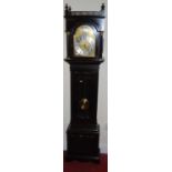 A circa 1900 mahogany longcase clock, the arched dial with silvered chapter ring, having striking