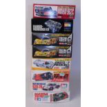 Eight various boxed Hasegawa and Tamiya 1/24 scale high speed racing and classic car kits to include