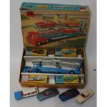 A Corgi Toys gift set 26 Carrimore Car Transporter with four boxed cars comprising of blue car