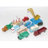 Dinky group of 12+ models and accessories as follows: 3x14a B.E.V trucks,752 goods yard crane,